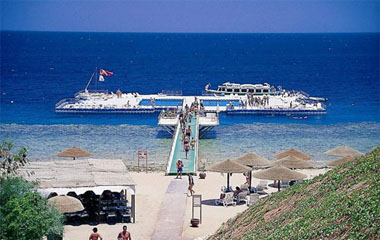 Пляж отеля Domina Hotel & Resort Oasis 5*
