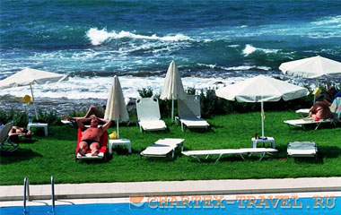 Пляж отеля Corinna Mare - Suites & Studios 3*