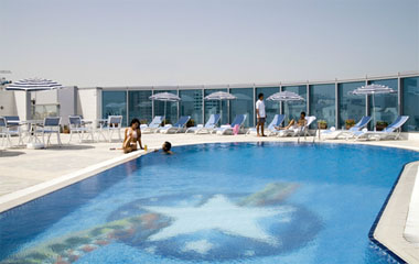 Отель Holiday Inn Sharjah 4*